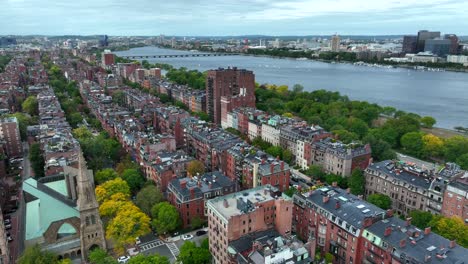 high rotating orbiting shot of housing in boston along charles river