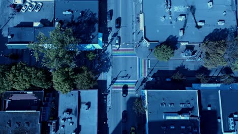 aerial birds eye view over gay pride lgbtq downtown community with iconic 3 painted road flags define sexuality for the village of davie bute on sunny summer day in vancouver canada jim deva square1-2