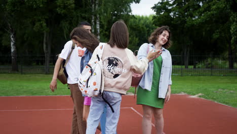 friends talking in the schoolyard