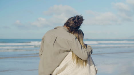 romantic caucasian couple spending time at beach