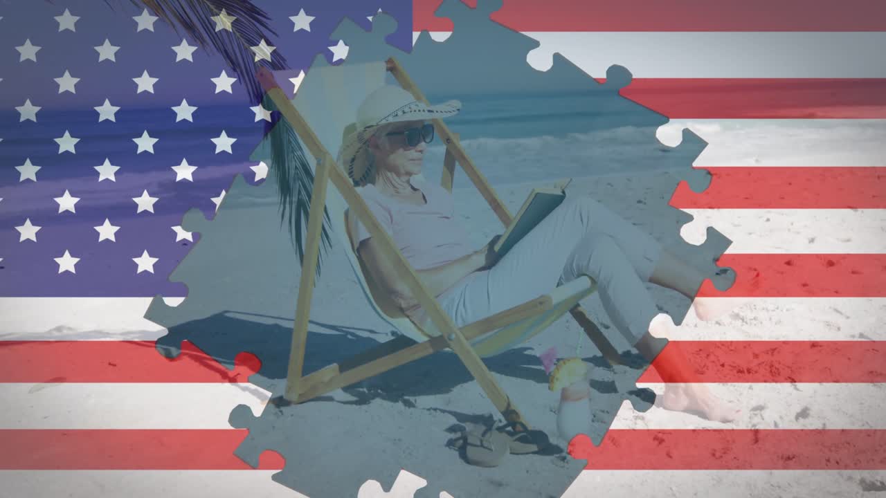 rompecabezas sobre la bandera estadounidense contra una mujer mayor leyendo un libro en la playa