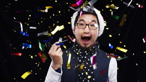 man celebrating with confetti and pipe