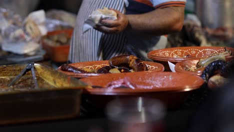 Street Food. Portuguese traditional spicy sausage being prepared and served