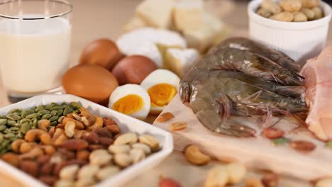 variety of protein foods on a black background