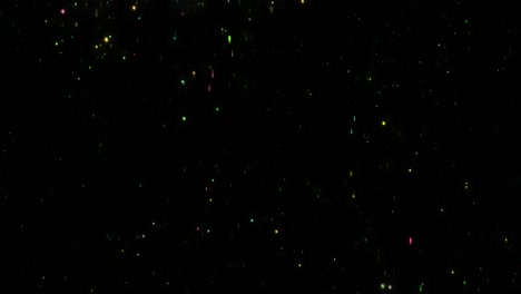 falling colorful glitter particles motion graphics with night background