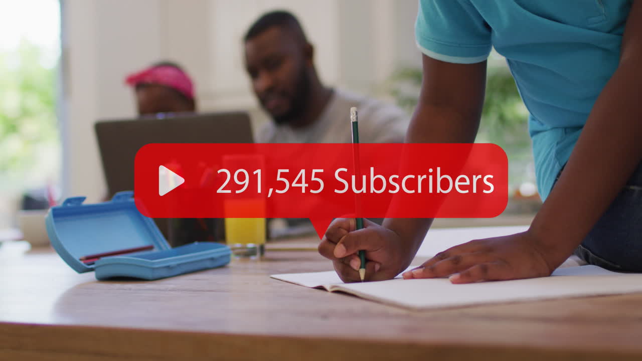 Animation of media icon over african american man using laptop with children