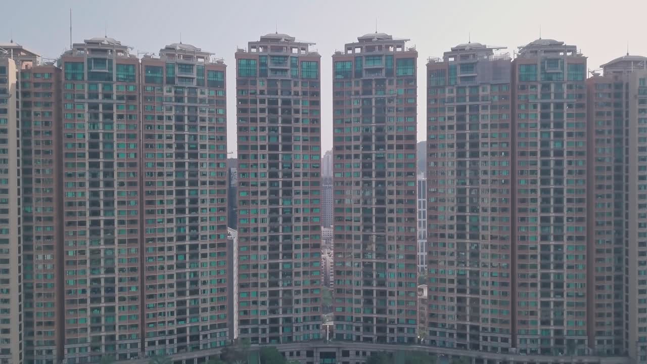 Residential blocks of flats skyscrapers in Happy Valley, Hong Kong. Aerial drone view