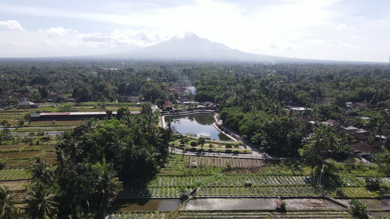 Beautiful aerial view of Mororejo reservoir, a reservoir located in Tempel, Sleman Regency, Yogyakarta. As irrigation and village park.