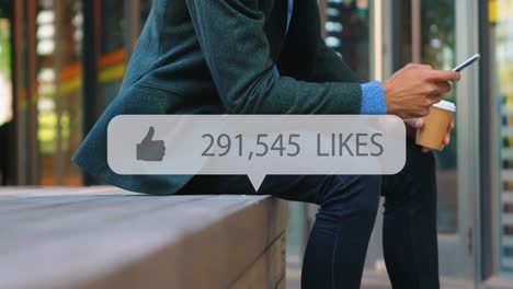 animation of media icon over biracial businessman using smartphone