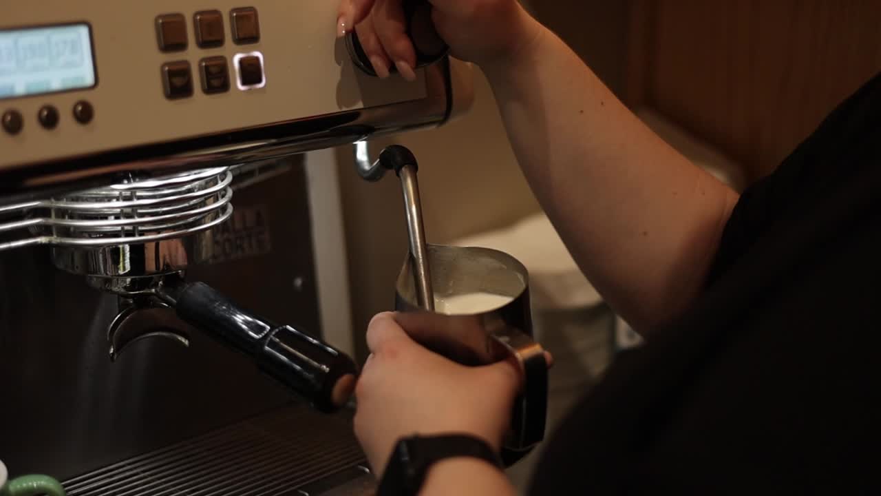 Barista making coffee drink