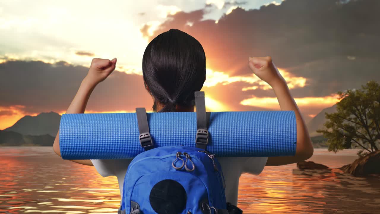 Close Up Back View Of A Female Hiker With Mountaineering Backpack Screaming Goal Celebrating The Success At A Lake