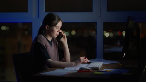 portrait of a financial analyst working on computer with multi-monitor workstation with real-time stocks commodities and exchange market charts