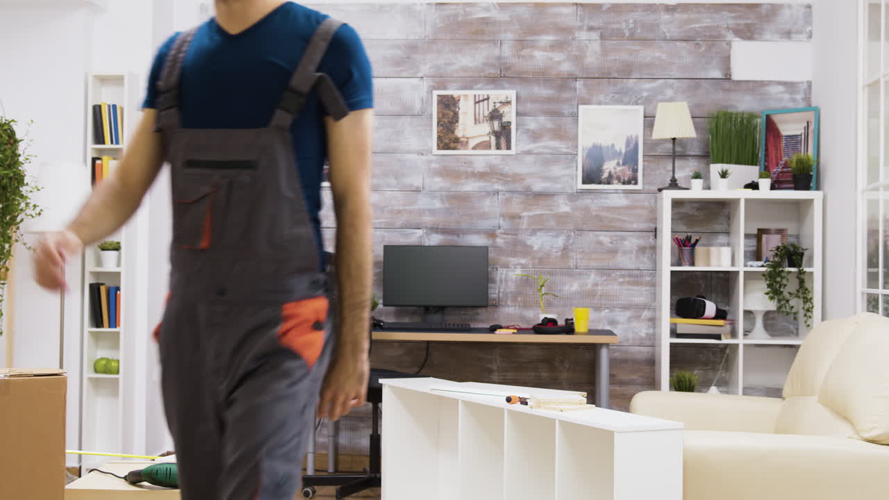 Man assembling furniture at home