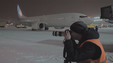 photographer working in the airport at night