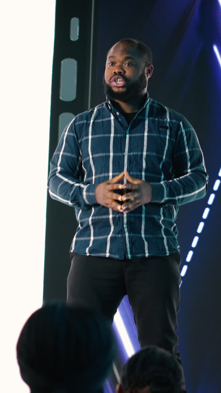 Vertical Video Black chief product officer introducing new smartphone with modern interface