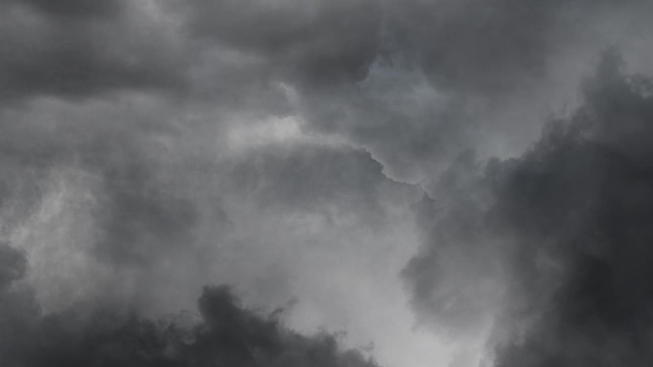 4k dark gray clouds accompanied by lightning strikes