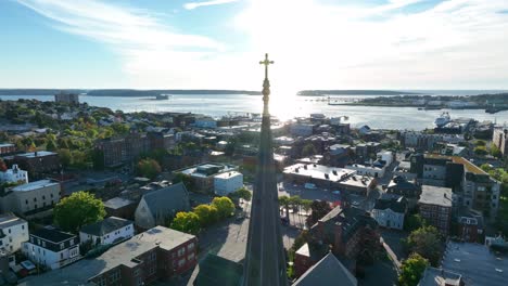 portland maine aerial view of city with morning sunrise reflecting on casco bay