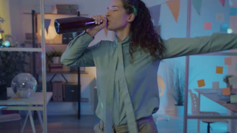 woman celebrating at office party