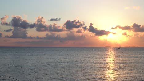 sunset sailboat on the ocean