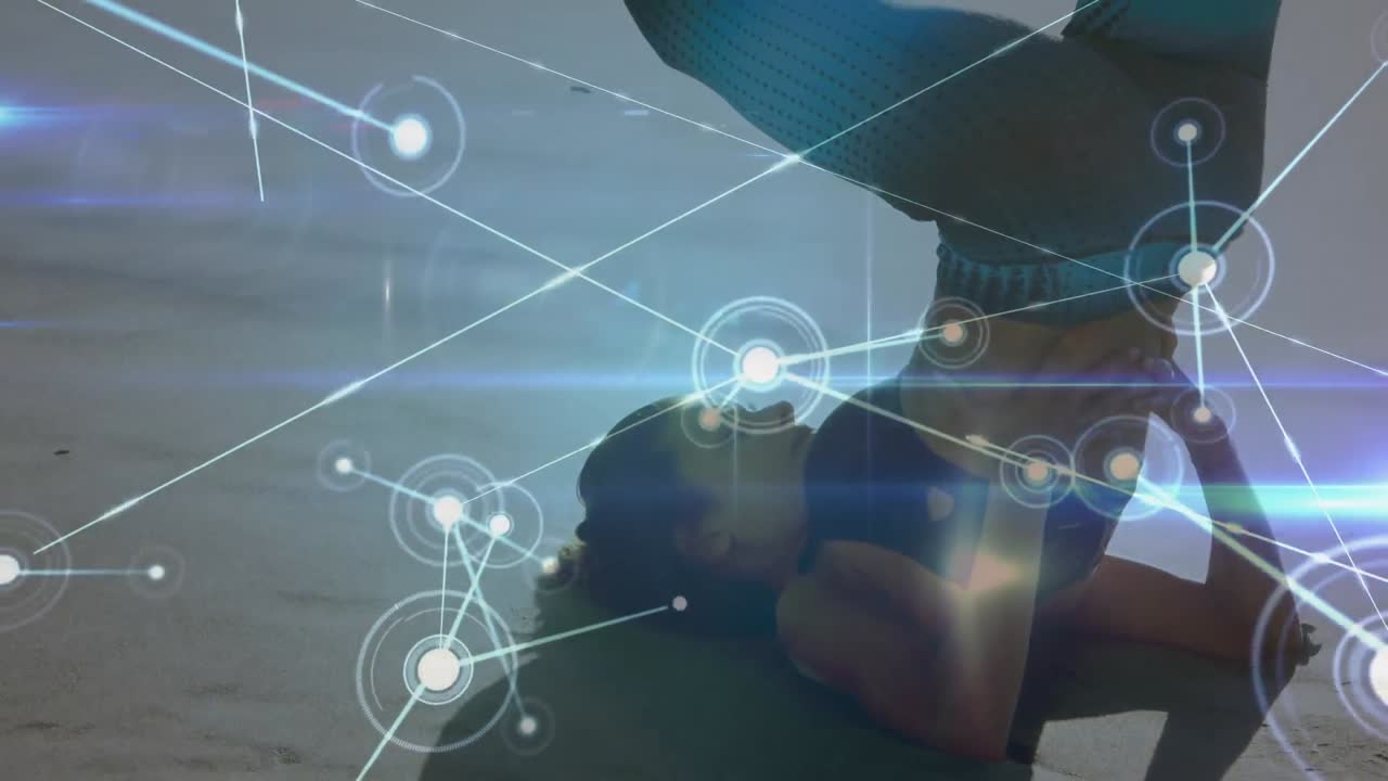 해변에서 요가를 연습하는 백인 여성에 대한 연결 네트워크의 활성화