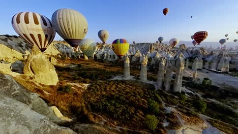 float above cappadocia’s fairytale landscape in a hot air balloon, bathed in sunrise hues and endless skies