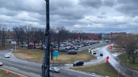 slow-motion-shot-of-a-parking-lot-in-the-borough-of-brooklyn-with-the-manhattan-skyline-in-the-background