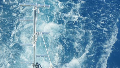 water foaming behind a boat