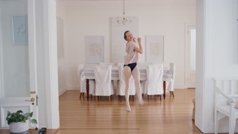 teenage ballerina girl dancing practicing ballet dance moves rehearsing at home 4k