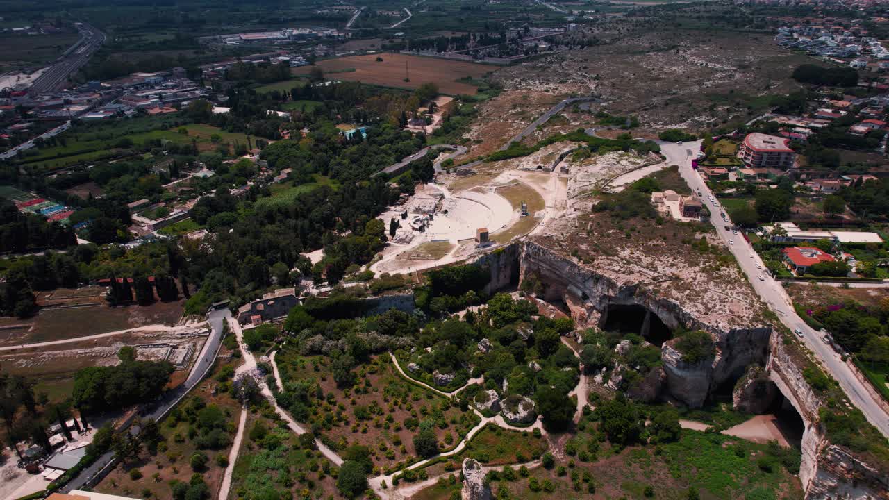 Archaeological structures, caves, theater and Roman ruins in Siracusa, Sicily, Italy. Scenic aerial