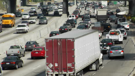 traffic moves slowly along a busy freeway in los angeles 5