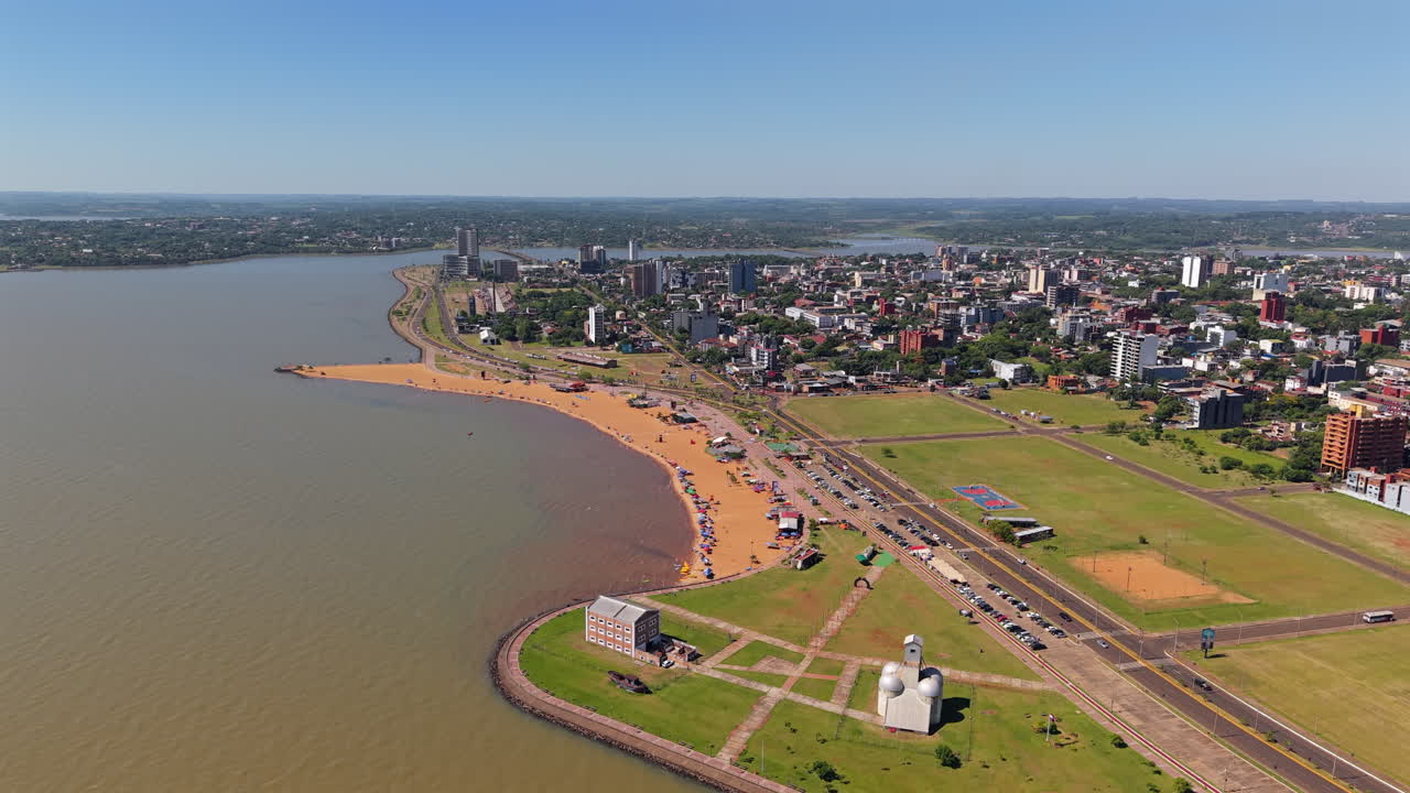 Aerial view of beach coastal city Playa San Jose on Paraná river Encarnacion Paraguay