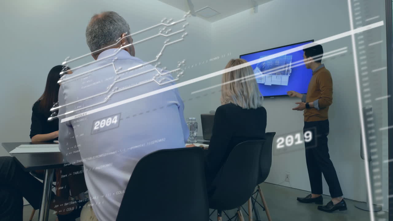 In meeting room, diverse team viewing business presentation with data processing animation