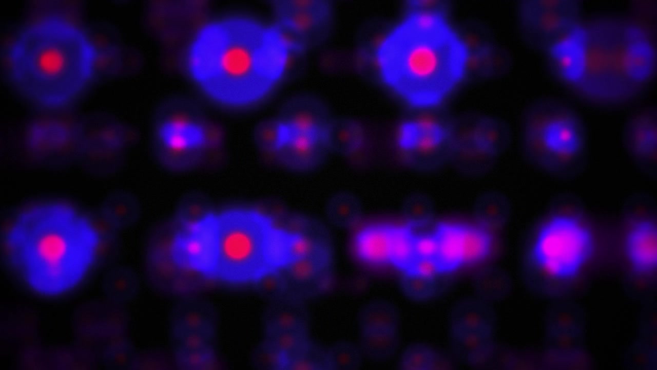 Sfondo astratto di sfere luminose blu e rosse pulsanti