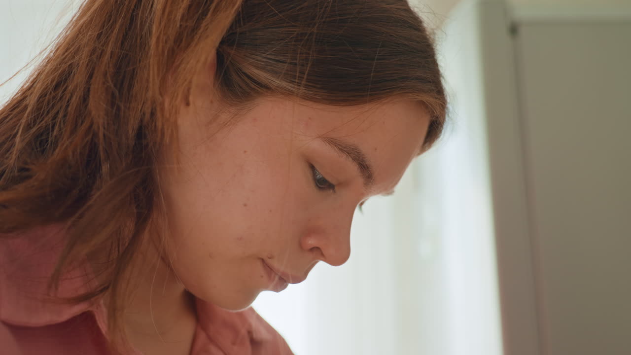 Woman Lovingly Looks At Her Small Dog Indoors, Indoor Scene Showing Woman Caring For Her Puppy Peacefully, Warm Morning In Home As Woman Gently Observes Her Adorable Dog With Affection