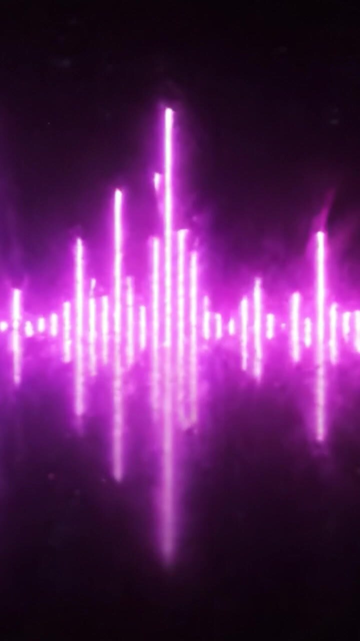 Visual Representation of Sound Waves Transitioning from Blue to Pink, Capturing the Rhythm and Dynamics of Music Through Vibrant Light Patterns