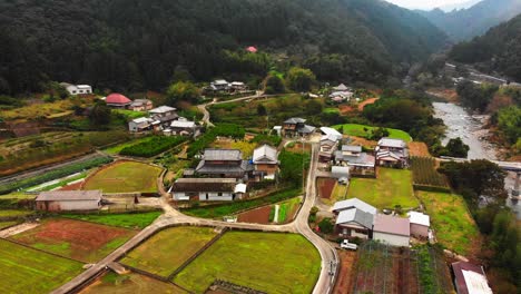 small village in japan alongside a beautiful river