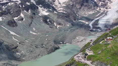 the großglockner high alpine road winding through rugged mountain terrain, aerial view