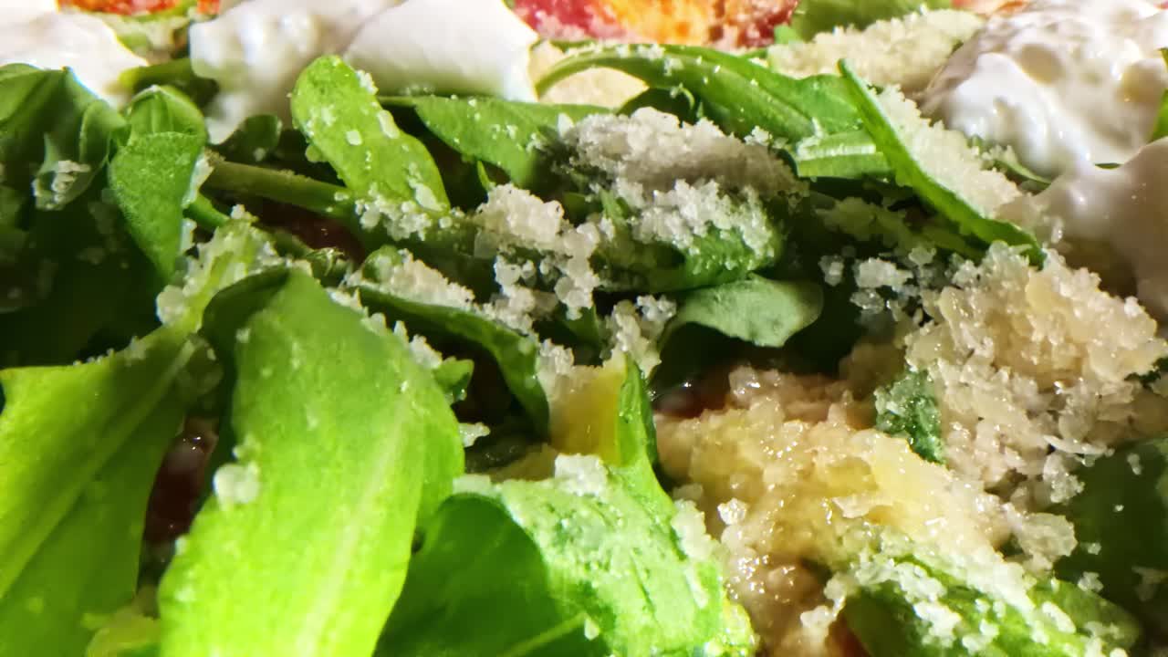 Crispy pizza with arugula and burrata cheese. Close up