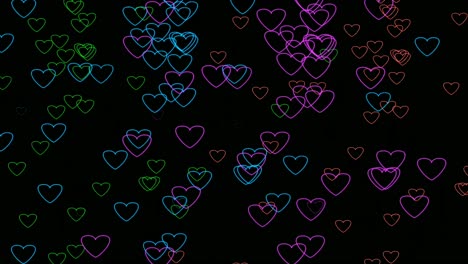 Neon-light-multicolor-love-heart-shape-animation-falling-on-black-background