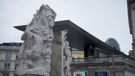 Low-angle-shot-of-famous-Albertina-museum-palais-palace-in-the-city-center-of-the-Austrian-capital-city-Vienna-on-a-cloudy-day