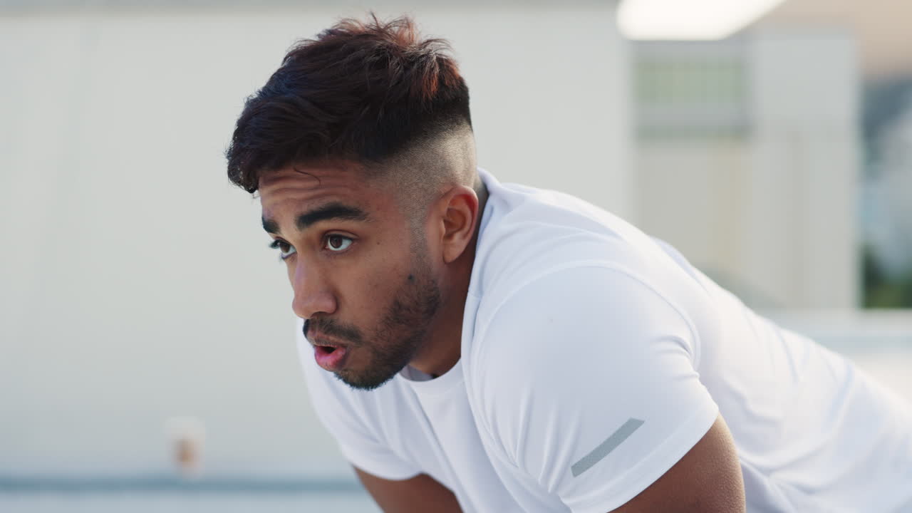 Fitness, city and tired man on a rooftop