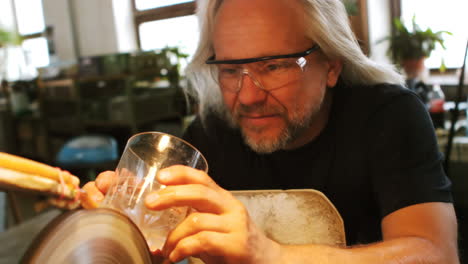 glassblower working on a glass