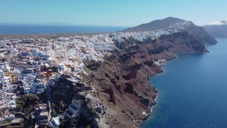 flying towards white houses of santorini, greece