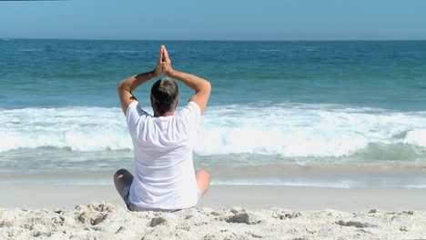 elderly man doing yoga