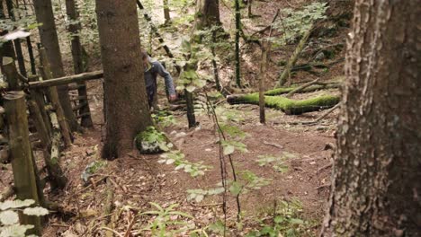 Man walking through Pokljuka Gorge in Slovenia during spring in the Triglav National Park-1