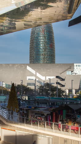 timelapse of the encants second hand market in barcelona and skyline behind in vertical