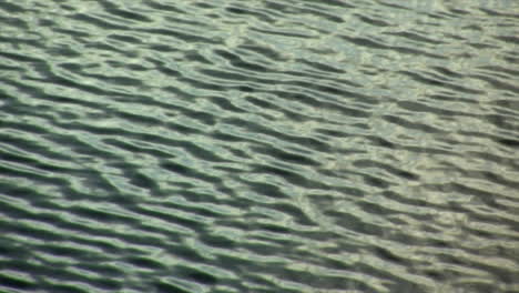 undulating surface waves of lake in slow motion