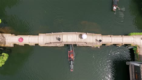 aerial photo of donghu lake in shaoxing, zhejiang, china, formed after thousands of years of artificial mining, showcasing beautiful and spectacular artificial landscapes