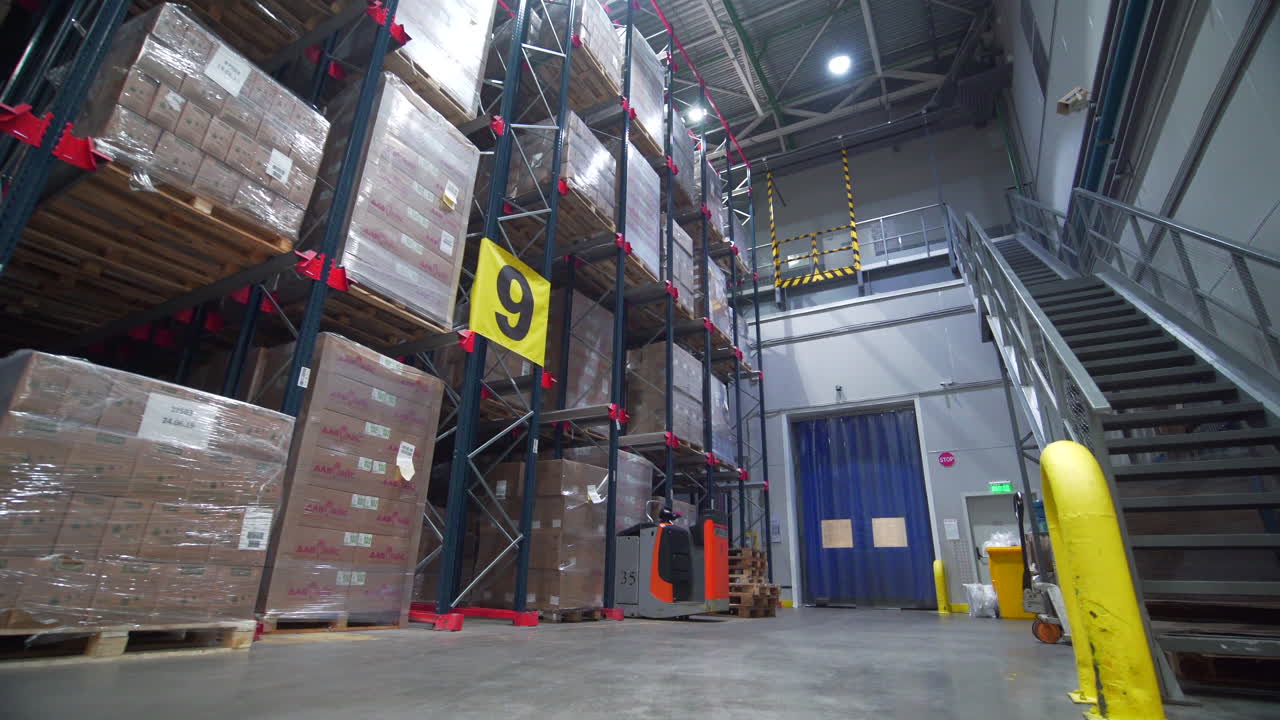 Warehouse Interior with Pallet Racking and Forklift