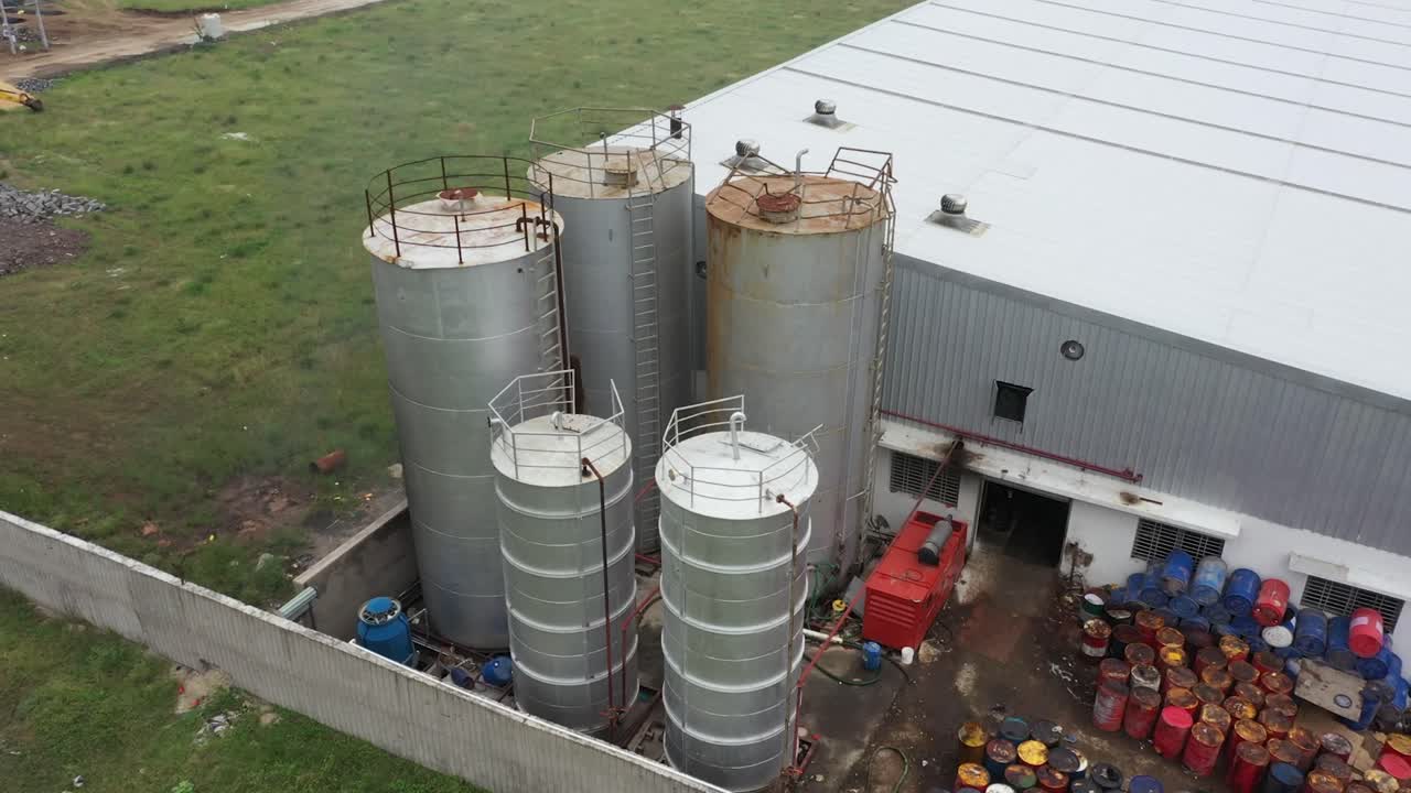 Aerial View of Industrial Area with Large Storage Tanks